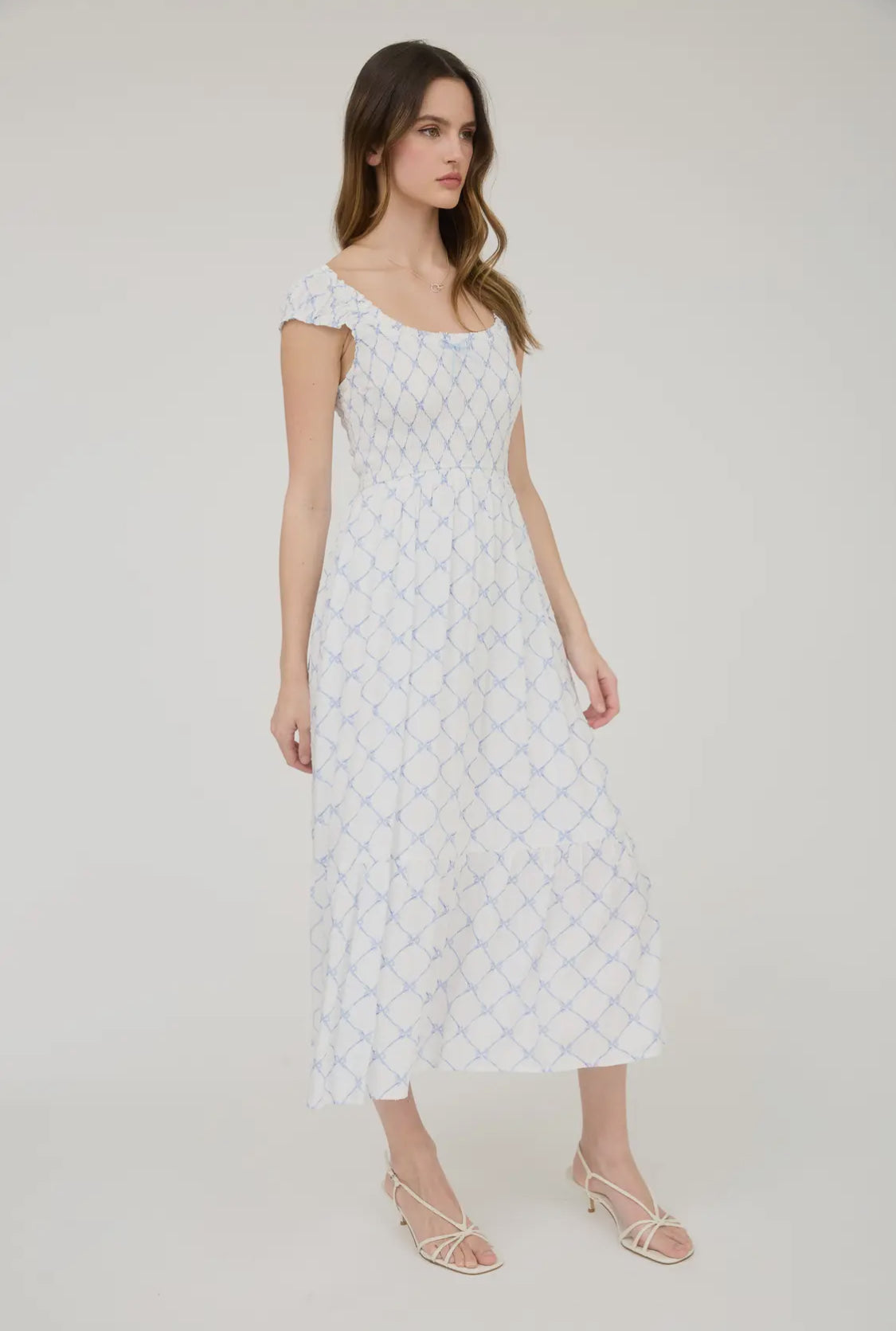 Bow pattern smocked midi dress