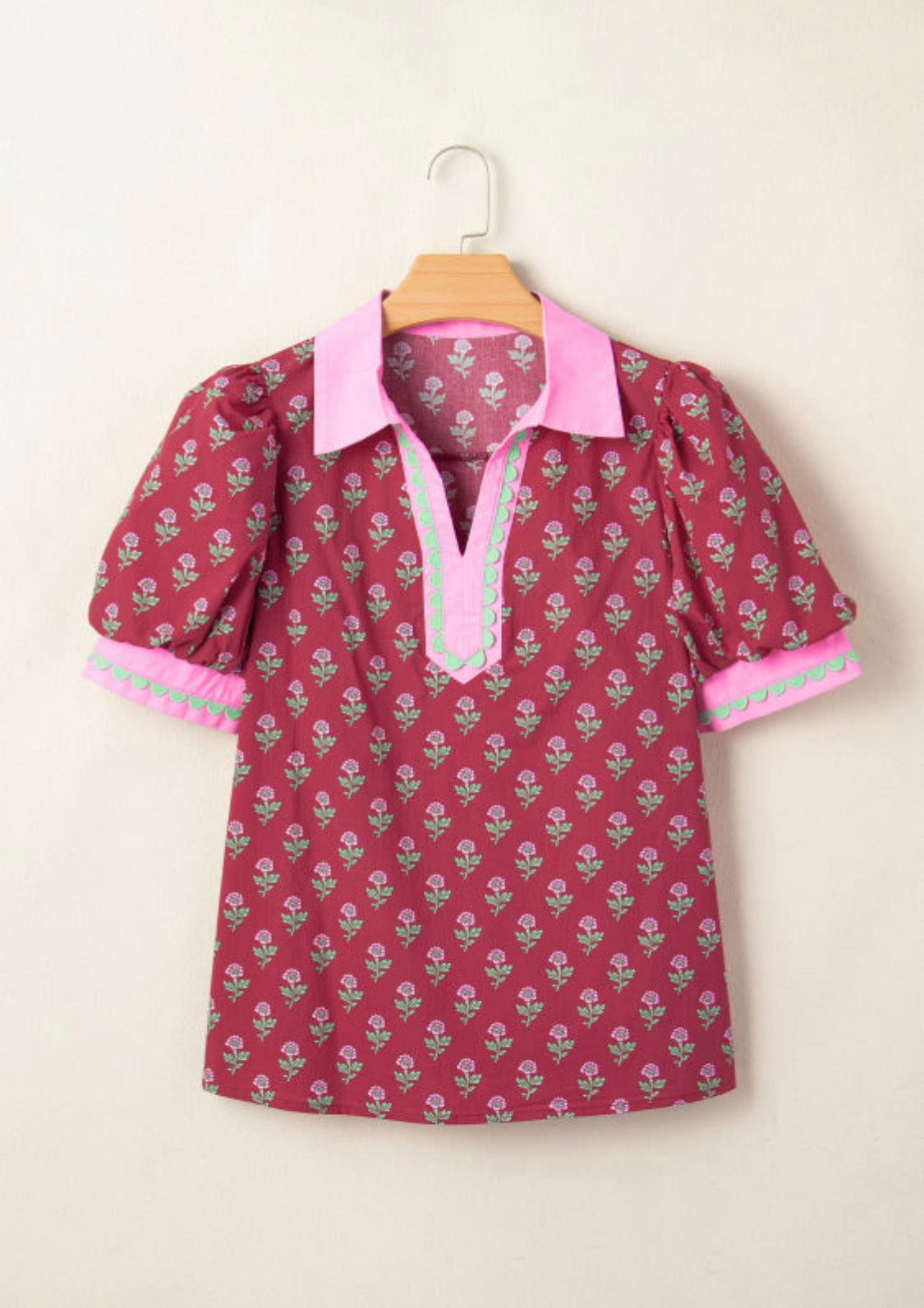 Red floral blouse