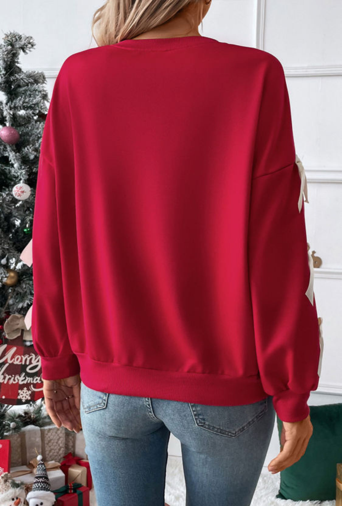 Red sweatshirt with bows