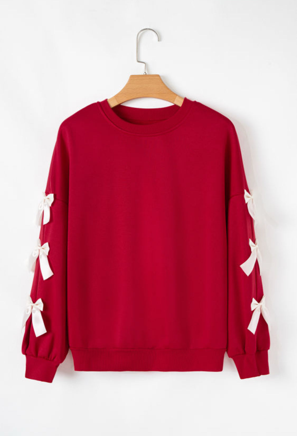 Red sweatshirt with bows