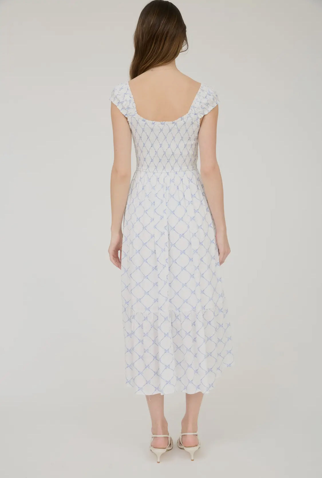 Bow pattern smocked midi dress
