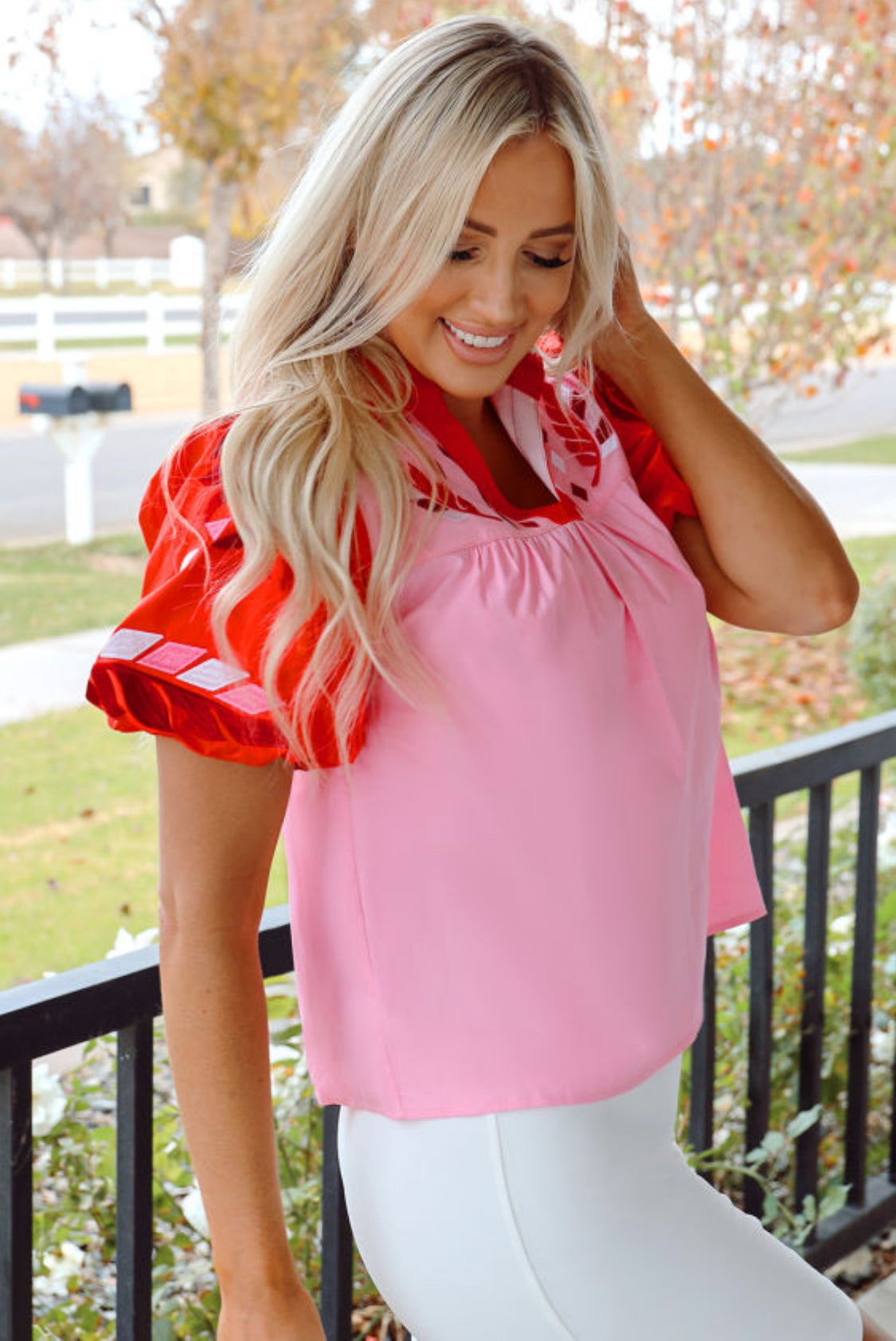 Red sleeve pink top