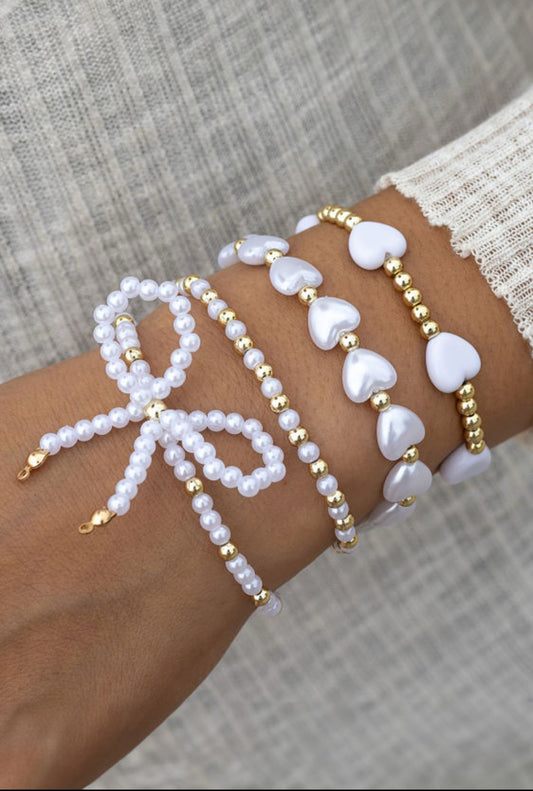 White bow beaded bracelet