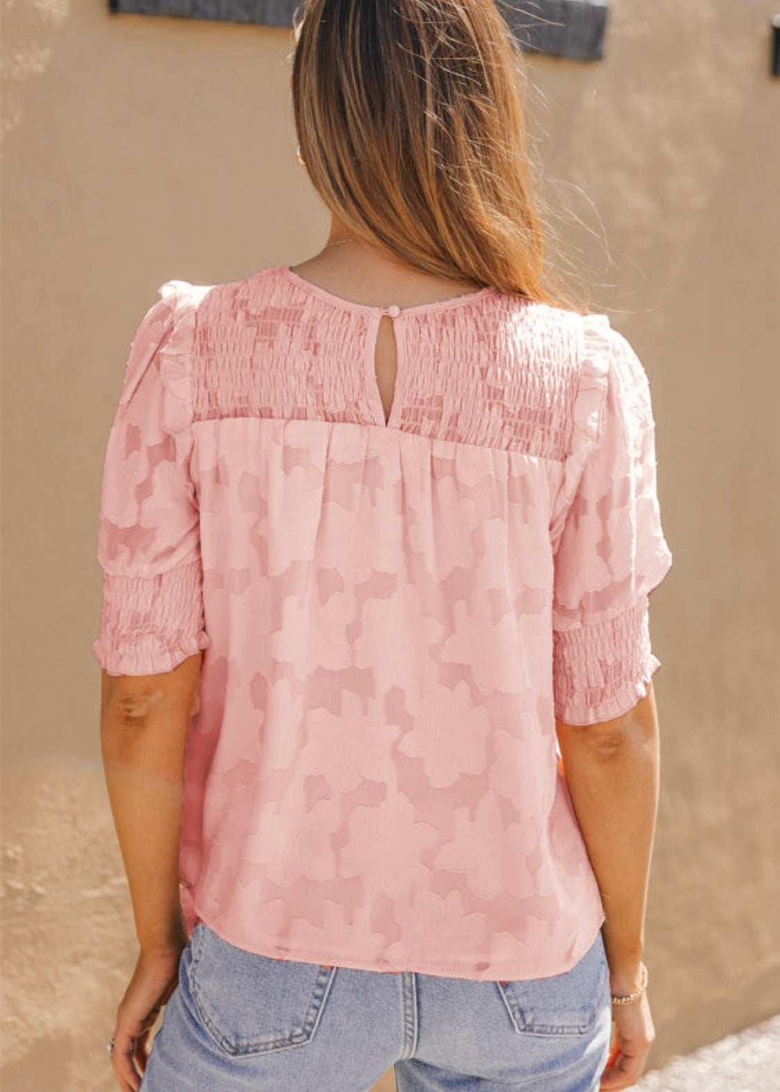 Peach smocked blouse