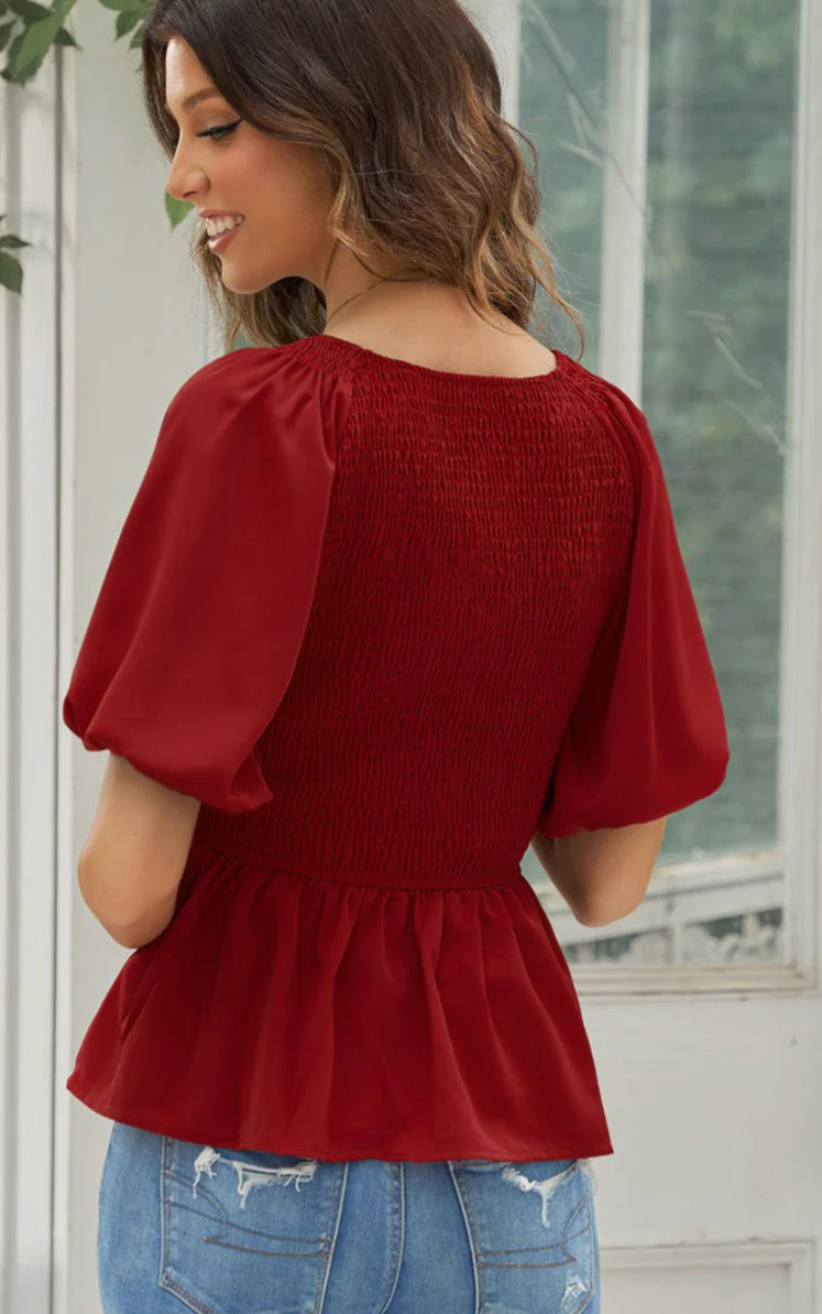 Smocked ballon sleeve peplum blouse