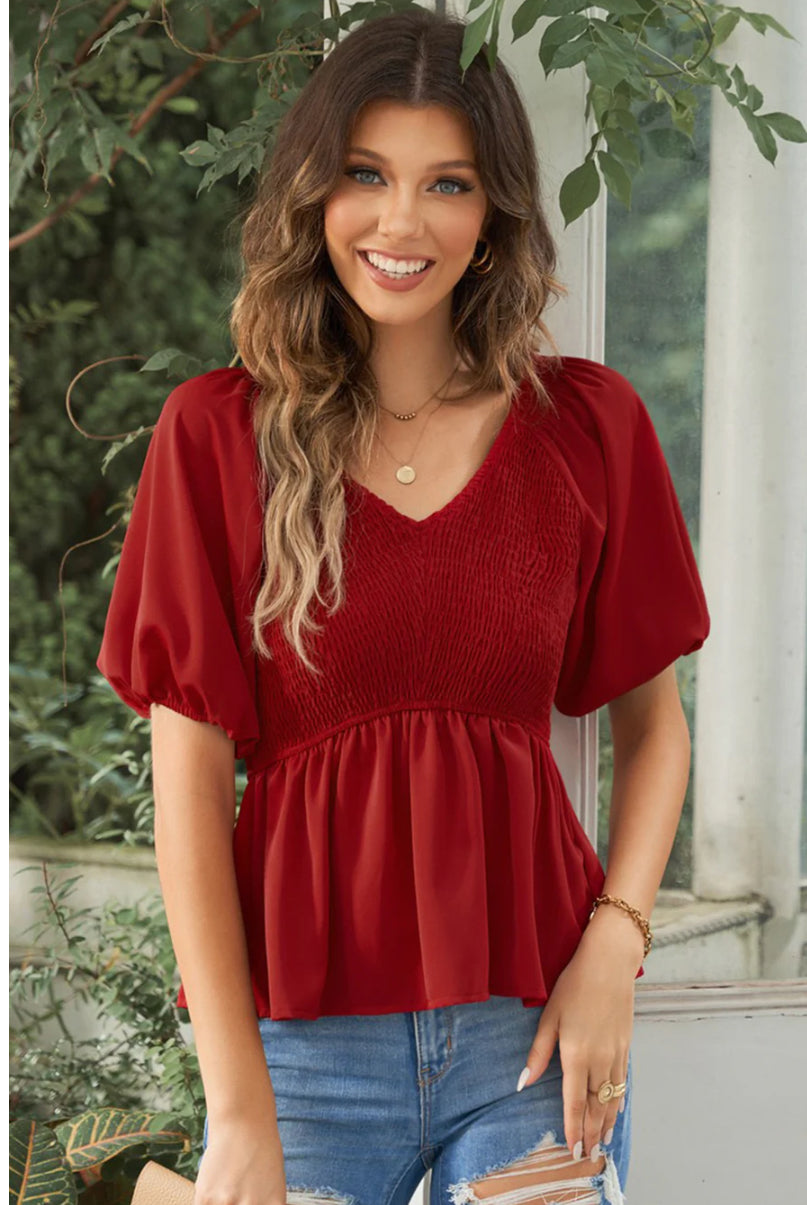 Smocked ballon sleeve peplum blouse