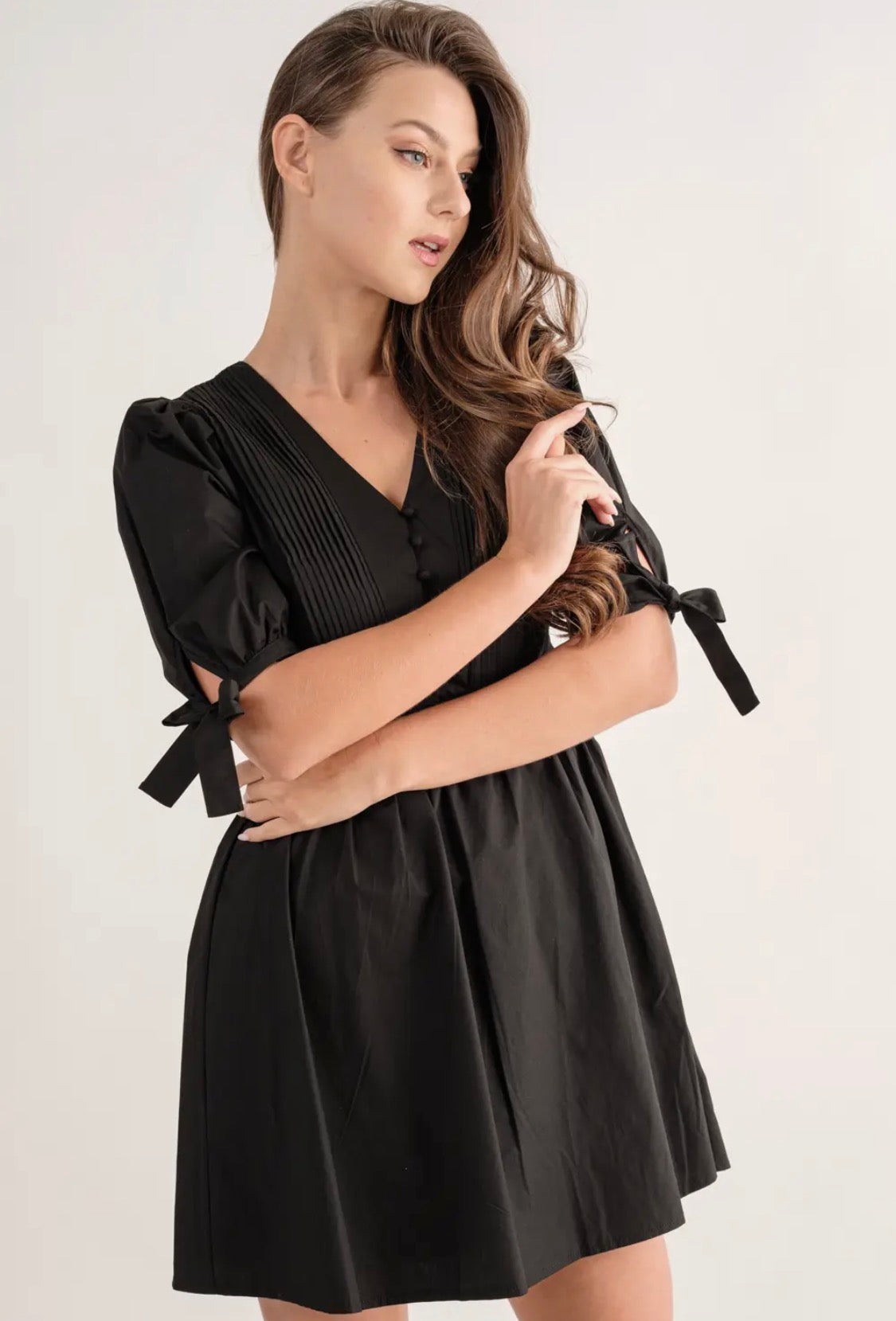 Black dress bow tie on the sleeve