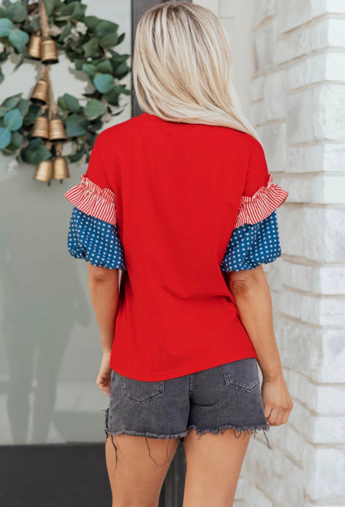 Red top blue stars sleeve