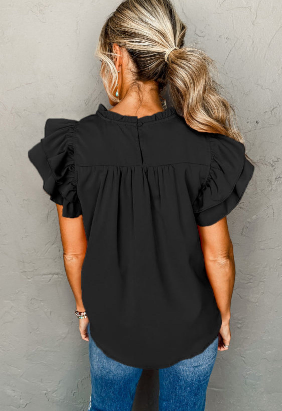 Black ruffle top