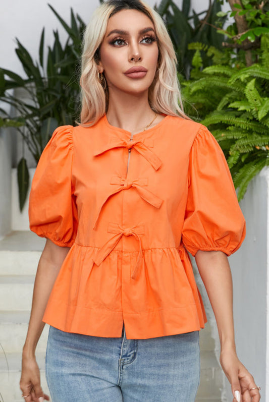 Orange peplum blouse