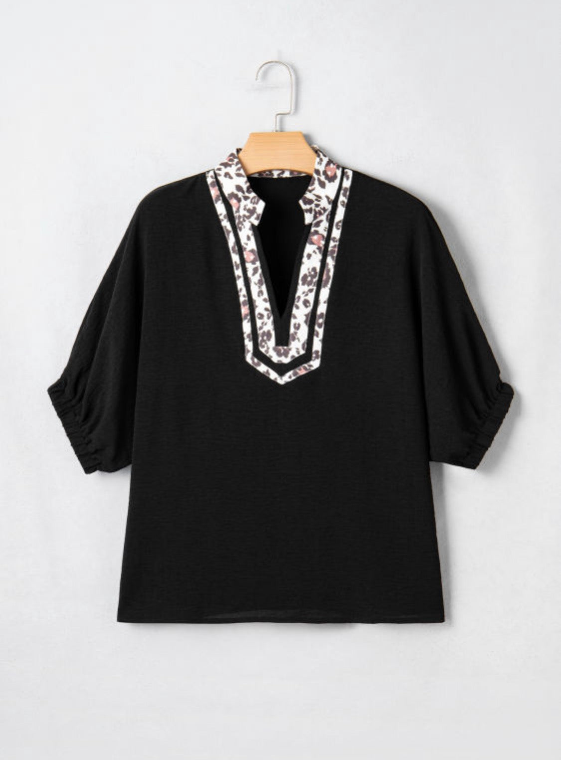 Black dolman haft sleeve leopard top