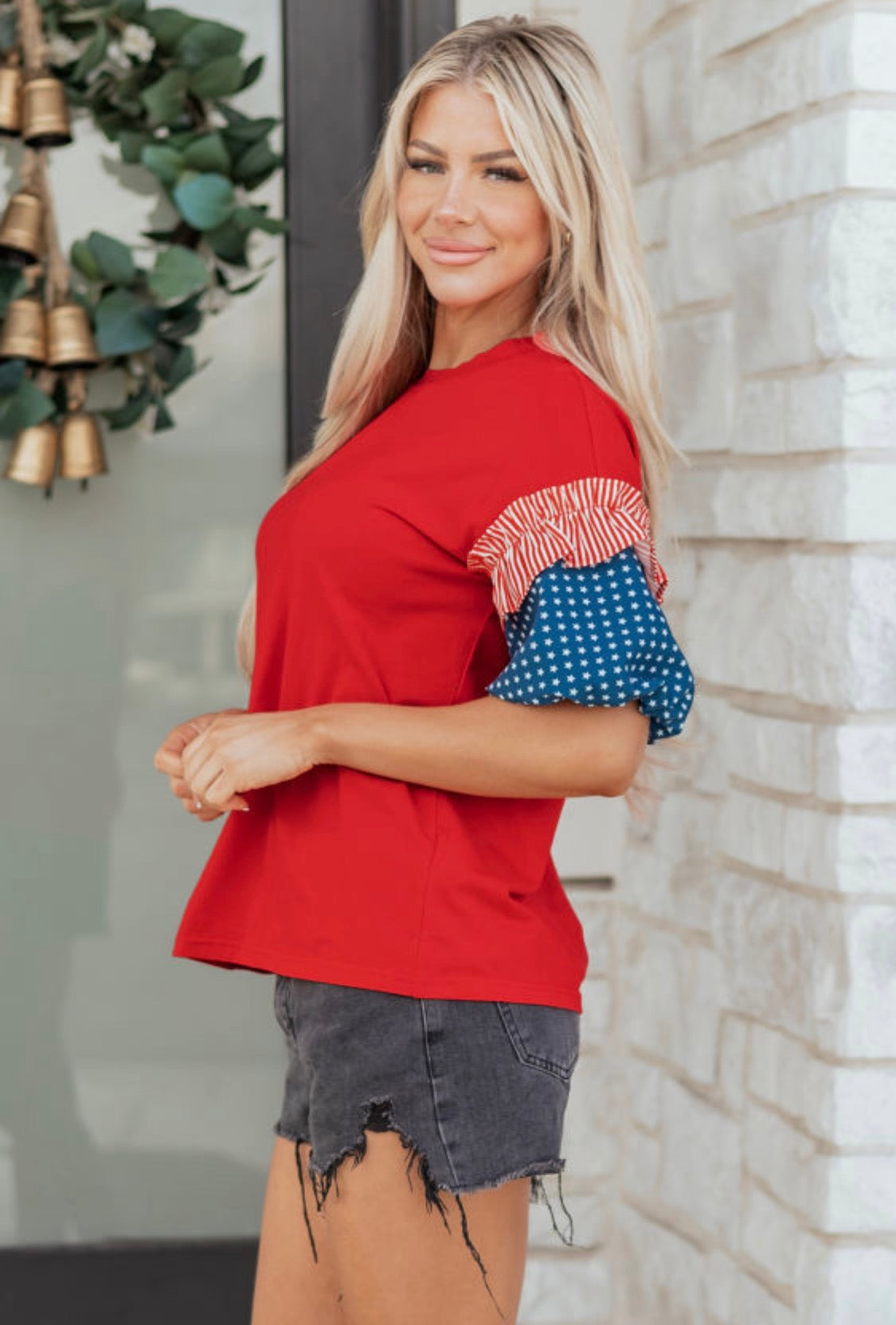 Red top blue stars sleeve