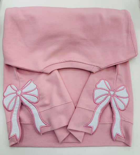 Pink sweatshirt with bows on the sides