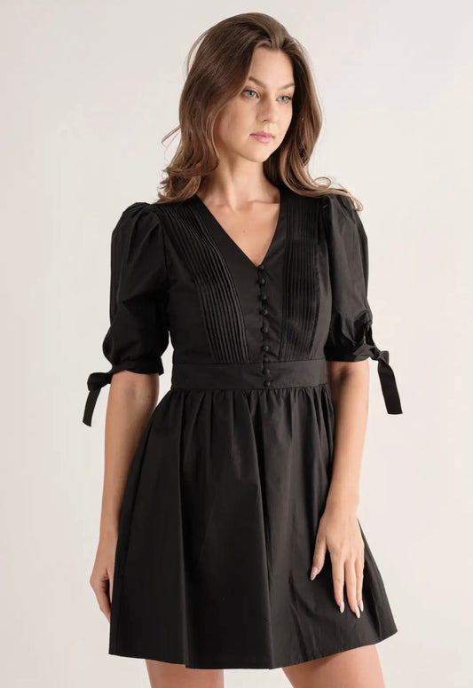 Black dress bow tie on the sleeve