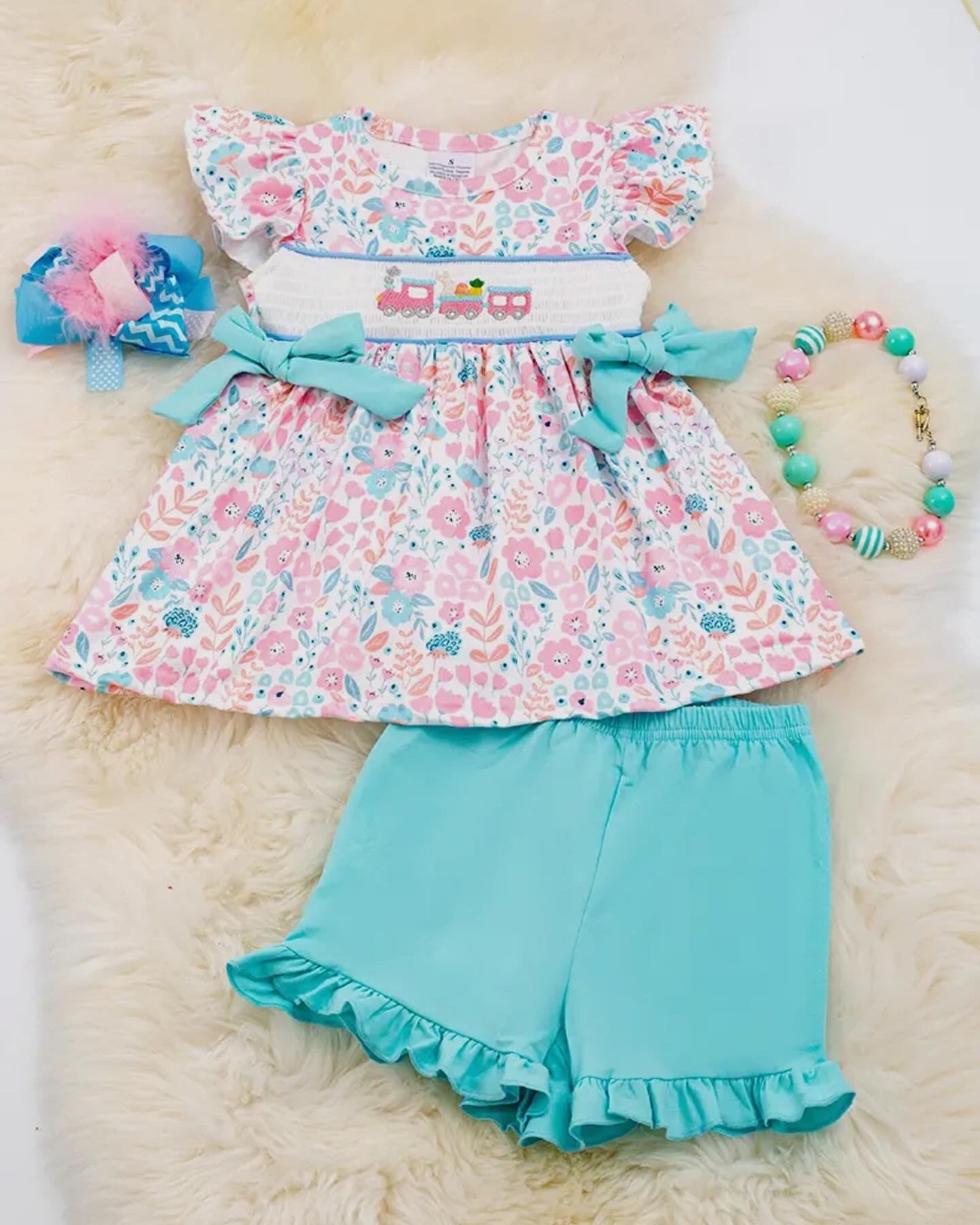 Floral smocked girl sets